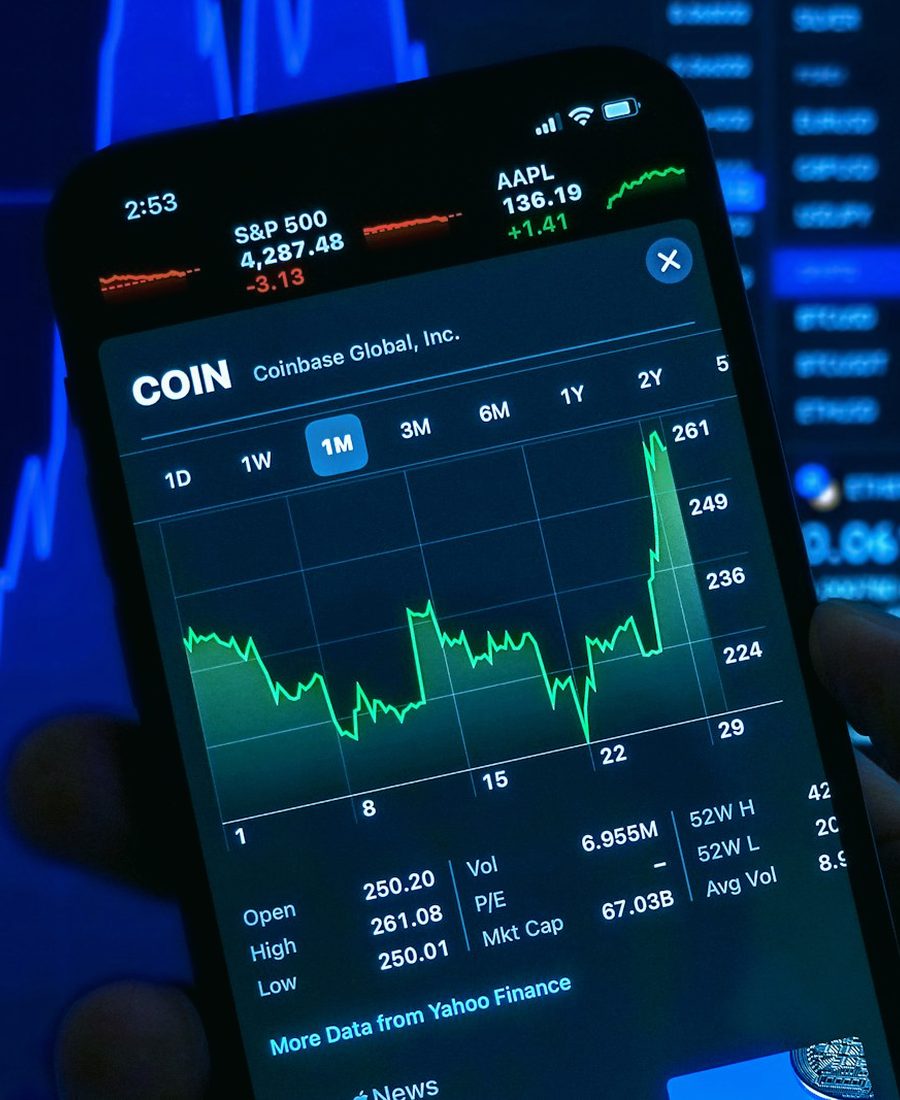 Phone with a live trading chart, USDT flash software